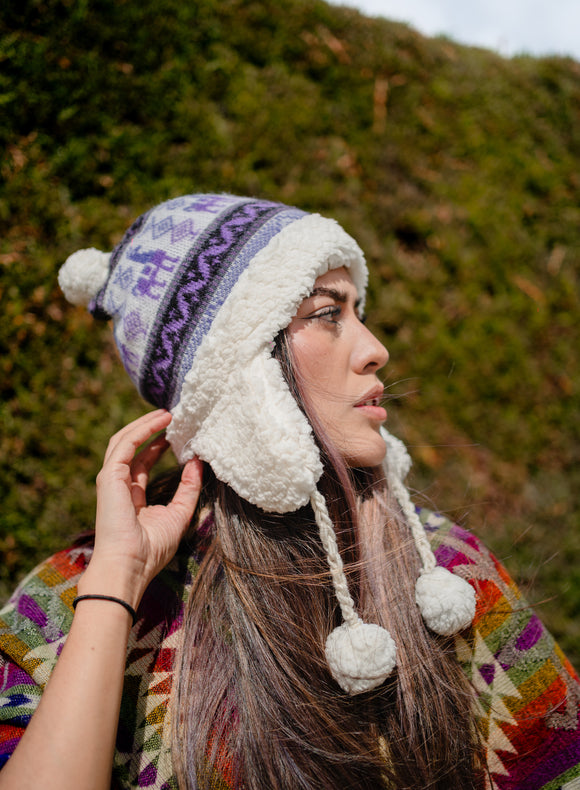 Alpaca hat with sheepskin interior coverage with earmuffs