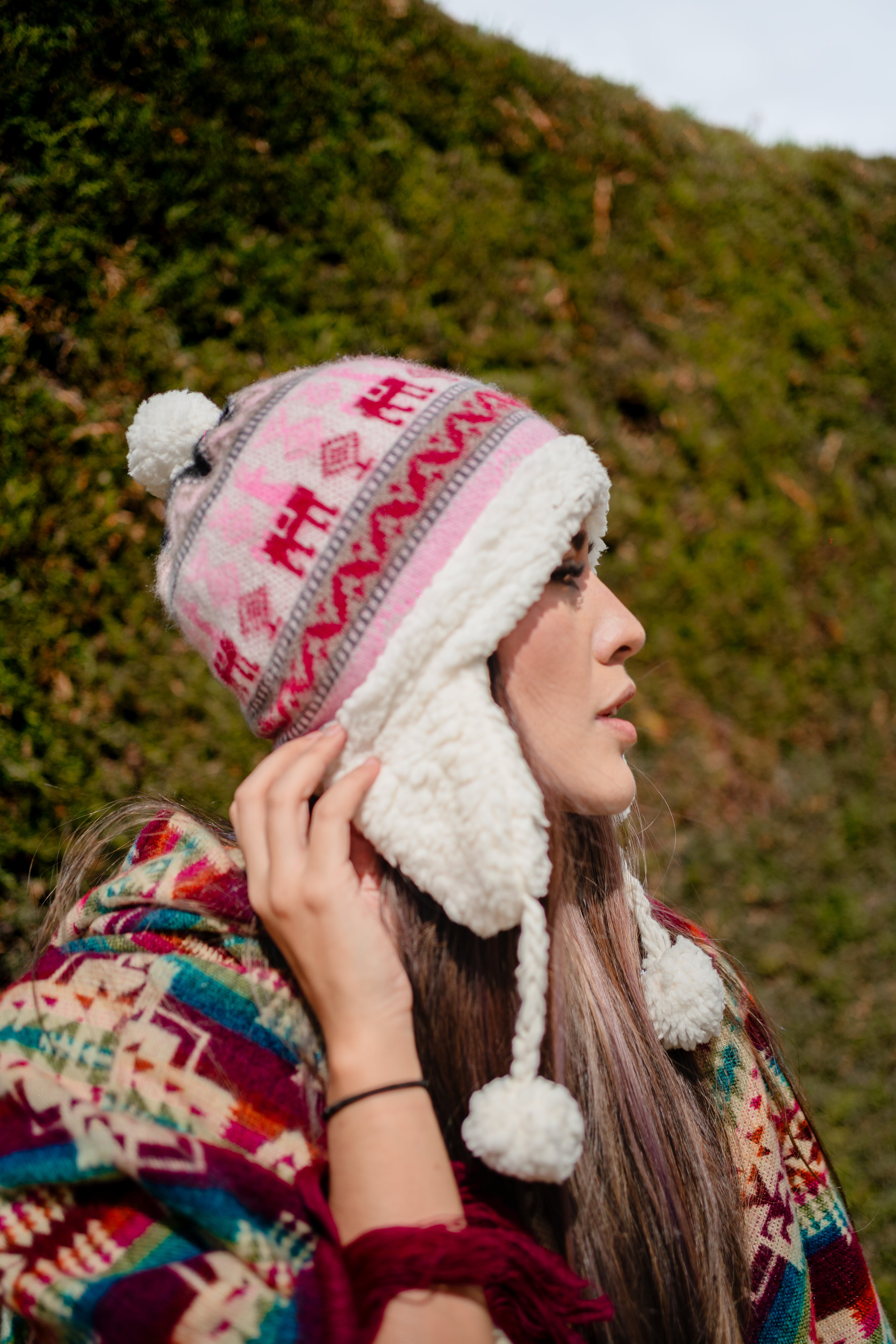 Alpaca hat with sheepskin interior coverage with earmuffs