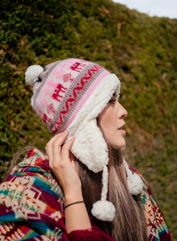 Alpaca hat with sheepskin interior coverage with earmuffs