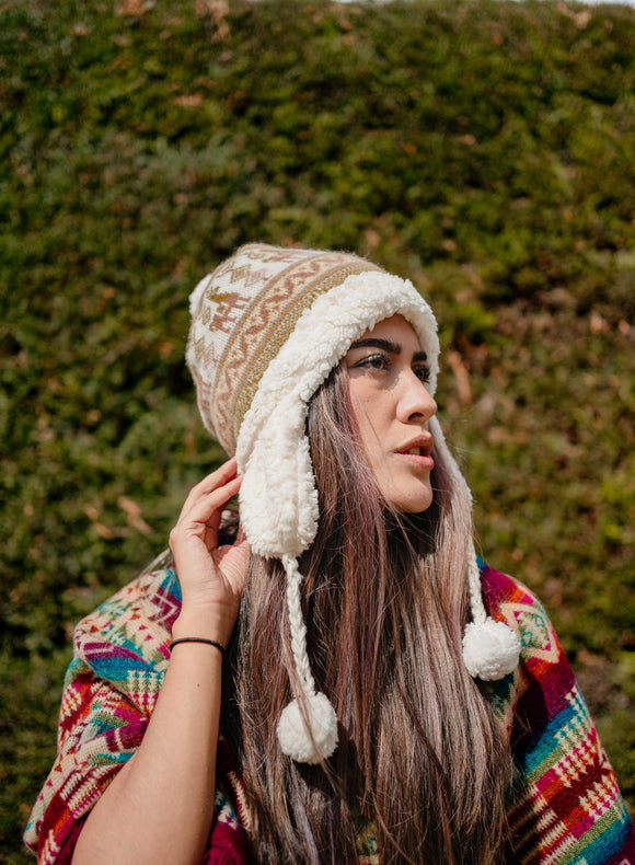 Alpaca hat with sheepskin interior coverage with earmuffs